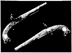 Vintage illustration of two flintlock pistols.