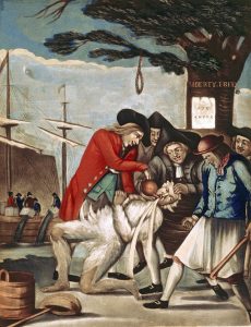 Political cartoon showing Bostonians forcing a British excise officer to drink tea, after tarring and feathering him.