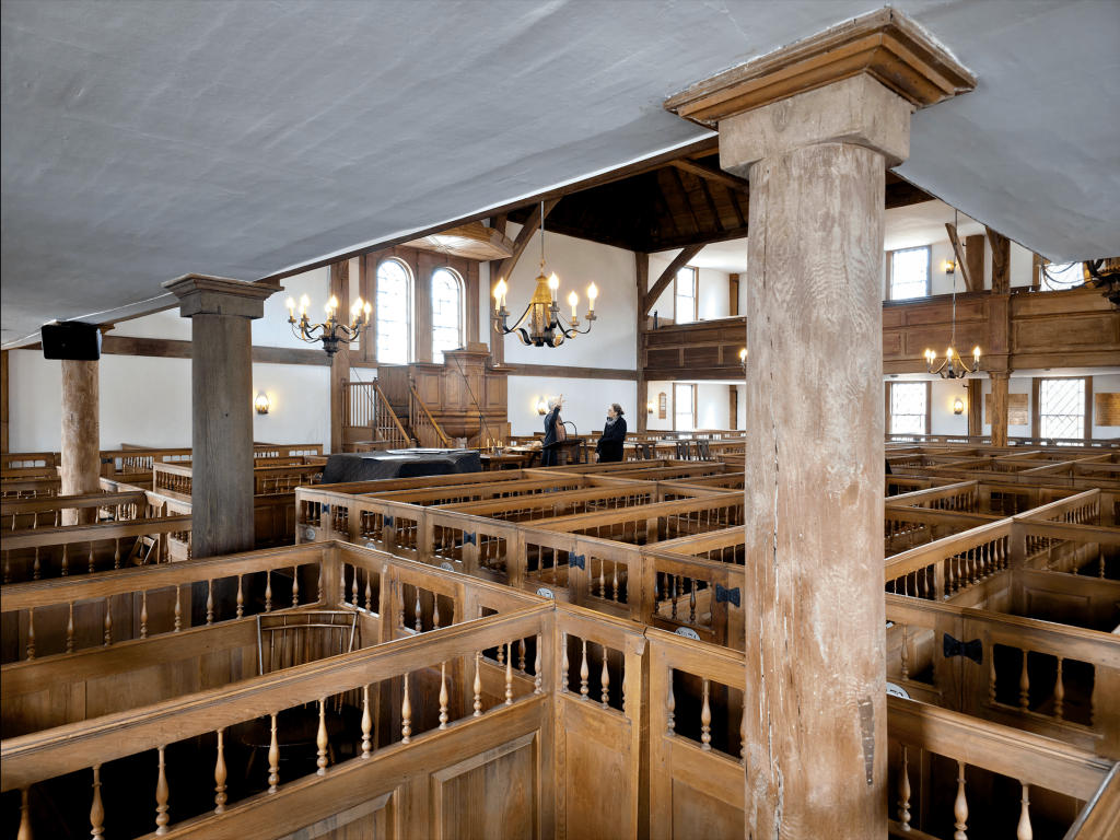 The interior of a preserved Puritan meetinghouse.